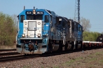 EMDX 9036, Oakway Lease unit leads sister Oakway and Helm Lease unit eastbound at Holiday on the BNSF